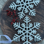 Schneeflocke mit Perlen, Aaryn